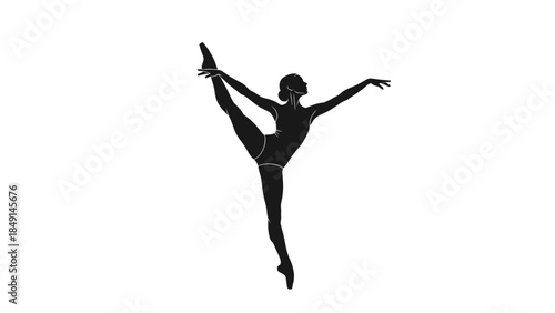 Elegant silhouette of a female ballet dancer performing an arabesque pose full body capturing