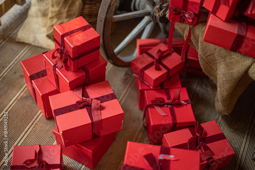 Gift boxes piled in a heap. Mountain of Christmas gifts close-up.