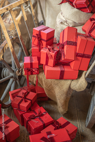 Gift boxes piled in a heap. Mountain of Christmas gifts close-up.