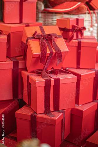 Gift boxes piled in a heap. Mountain of Christmas gifts close-up.
