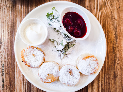 Syrniki, fried Eastern Slavic quark pancakes. homemade Syrniki, a part of Ukranian and Russian cuisine
