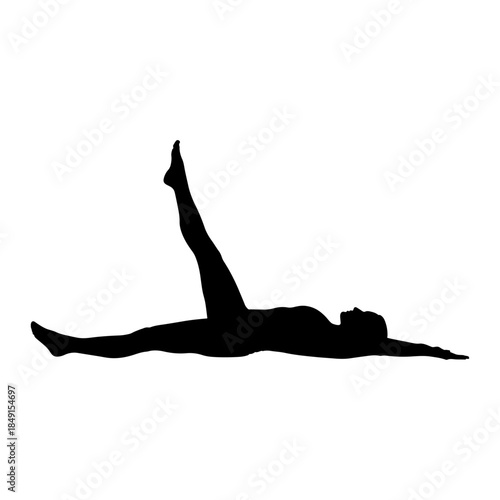 Silhouette of Person Performing Dynamic Pilates Exercise.