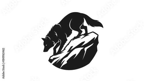 Silhouette of a howling wolf perched on rugged rocks with a moonlit background
