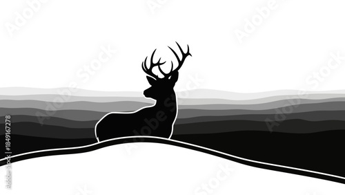 Silhouette of a majestic stag with sprawling antlers standing on a hilly landscape under