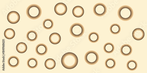 Collection of assorted metal washers on beige.
