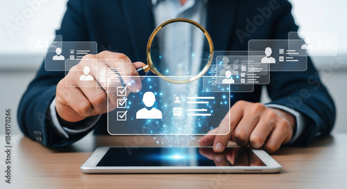 Digital recruitment analytics with magnifying glass over tablet showcasing candidate profiles selection process and modern human resources technology