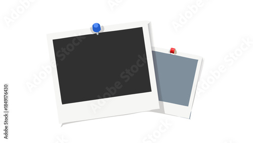 Instant photo frames pinned to a surface, showcasing memories or creative displays