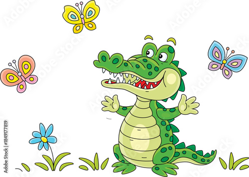 Happy green crocodile playing with colorful butterflies on a summer lawn with flowers, vector cartoon illustration on a white background