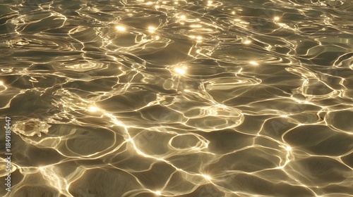 Golden Sunlight Reflections on Water Surface - A Mesmerizing Abstract Display.