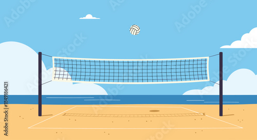 An empty beach volleyball court with a net and ball on a sandy shore with the ocean and blue sky in the background.