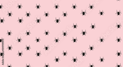 A creepy-cute seamless pattern of small black spiders scattered across a contrasting and unconventional light pink background.