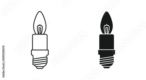 Two candle shaped light bulbs are displayed one white and one black a striking silhouette