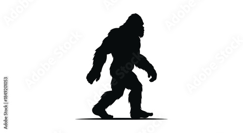 A striking black silhouette of a large bipedal creature walking forward a mysterious silhouette