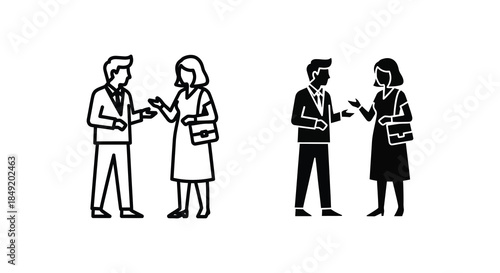 Four business professionals engaged in conversation depicted as a striking black and white silhouette