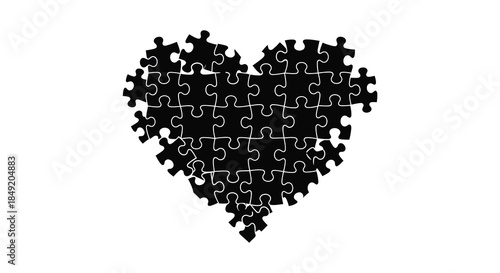 A striking black heart shape composed of interlocking puzzle pieces a beautiful silhouette
