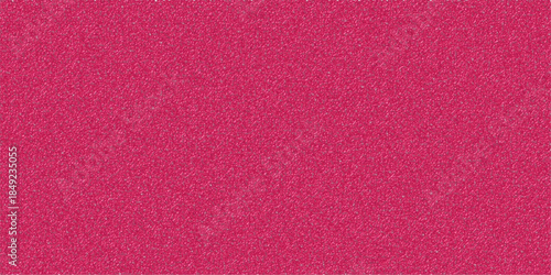 Close-up view of a vibrant fuchsia pink textured background with a fine, grainy surface, suitable for abstract designs or backdrops.