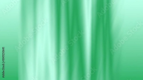 Abstract green flowing background with soft textures and light gradients for graphic design or video