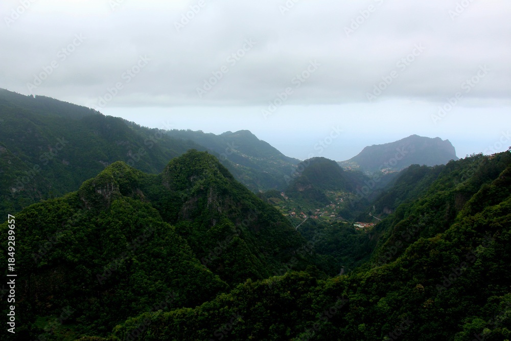 Naklejka premium tropical mountain landscape with clouds