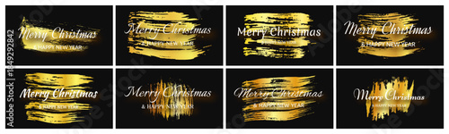 Merry Christmas and Happy New Year incription on gold smear