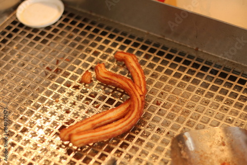 Freshly Fried Oily Churros at a Street Food Stall