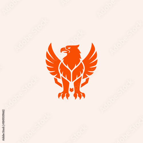 Stylized Orange Eagle Emblem with Wings Spread Wide.