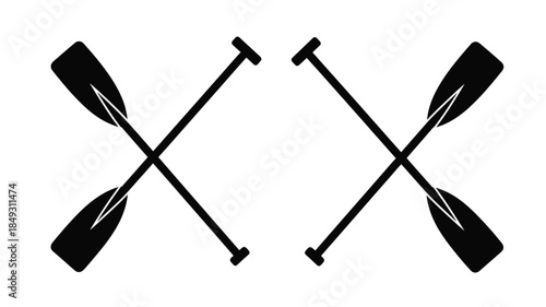 Two crossed oars creating an x shape a striking silhouette