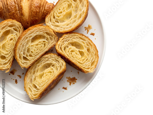 Delightful Freshly Baked Croissants: A Tempting Display of Flaky Pastry Treats on a White Plate