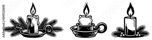 Collection of burning christmas candles in candle holders with pine branches and flames