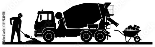 Construction worker shoveling cement from mixer truck into wheelbarrow on site