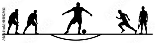 Silhouette of football player kicking ball during match with referee and goalkeeper