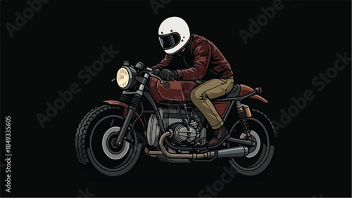 Motorcyclist riding a classic cafe racer motorcycle.