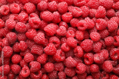 Fresh ripe raspberries as background, top view