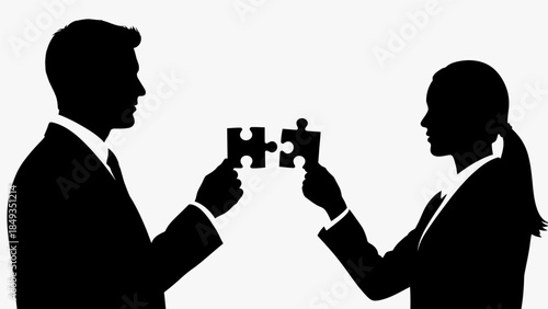 Business colleagues assembling puzzle pieces together in office setting.
