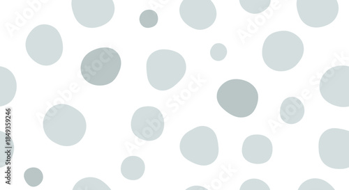 Grey dots on white background pattern.