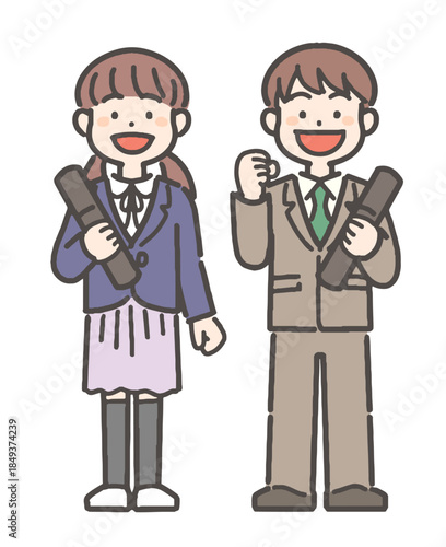 卒業証書を持って笑顔の、男の子と女の子の小学生