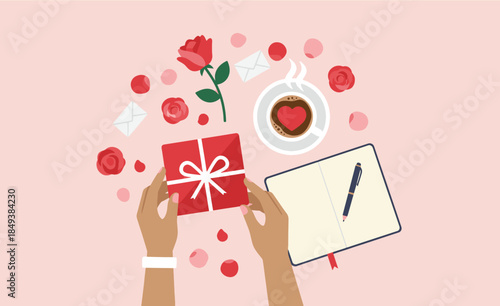 Romantic composition with gift box, coffee, rose and letter and hands on pink backdrop, expressing love. A top-down view shows delicate hands holding a gift, surrounded by love elements