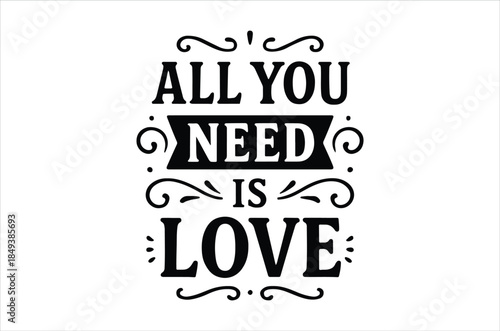 Bold typographic design proclaiming all you need is love with decorative swirls and a striking visual impact