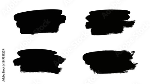 Set of four hand-drawn black ink brush stroke splatters on a white background