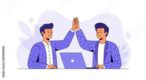 Two businessmen high fiving in modern office with laptop
