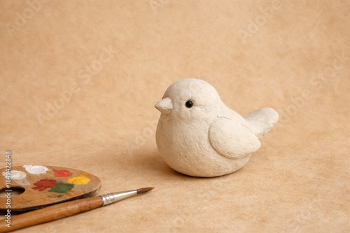 Creative Bird Sculpture: An Artful Fusion of Color, Texture, and Feathers on a Unique Design Palette