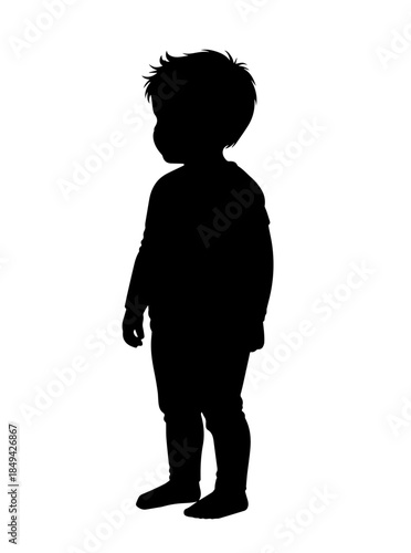 Against a stark white background, this solid black silhouette captures the side profile of a young child standing facing left, detailing the texture of his spiky hair and the soft drape of his clothes
