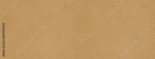 Brown kraft paper sheet - seamless background texture. Recycled cardboard carton packaging banner.