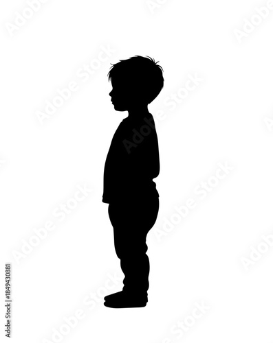 Set against a stark white background, this solid black silhouette captures the side profile of a young boy standing still, clearly outlining his tousled hair and casual clothing in a detailed shadow