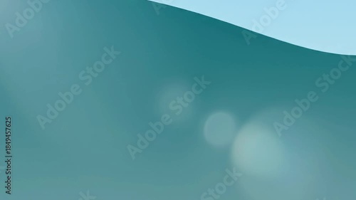 This mesmerizing abstract video features a serene underwater perspective, showcasing tranquil deep blue and teal tones. Soft light gently undulates and refracts through the fluid medium, creating a ca