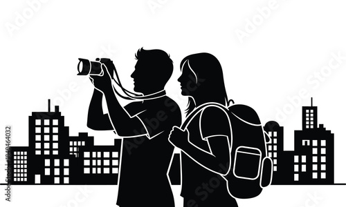 Silhouette of a couple taking photos of a cityscape while on vacation