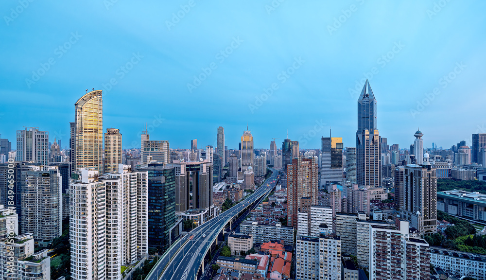 Obraz premium Aerial view of the modern city commercial buildings and elevated highway in Shanghai.