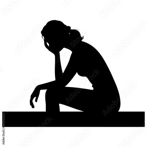 Silhouette of a depressed woman rests head on hand