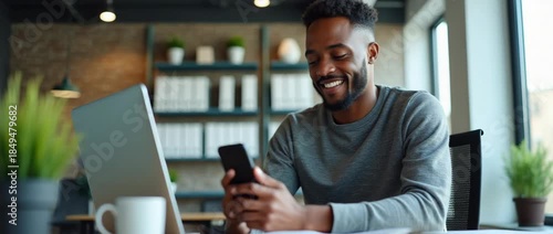 Focused professional man smiling while working on a smartphone in a modern office, with gentle ambient light flickering; the camera slowly pans to capture the contemporary workspace in a cinematic sty