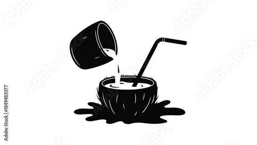 Refreshing coconut drink being poured into a tropical beverage with a straw.