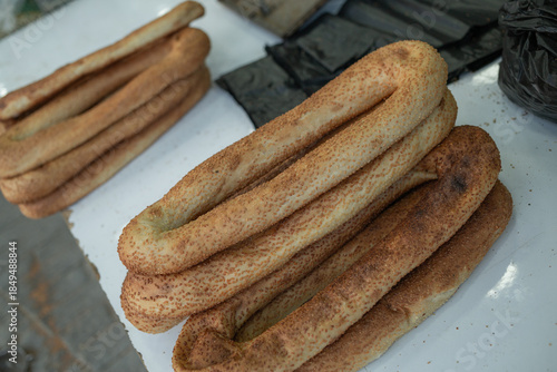 a lot of sesame-coated long breads at the market in east jerusalem
